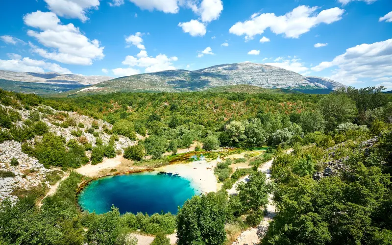Aerial view of the Eye of the Earth, the deep blue spring of the river Cetina